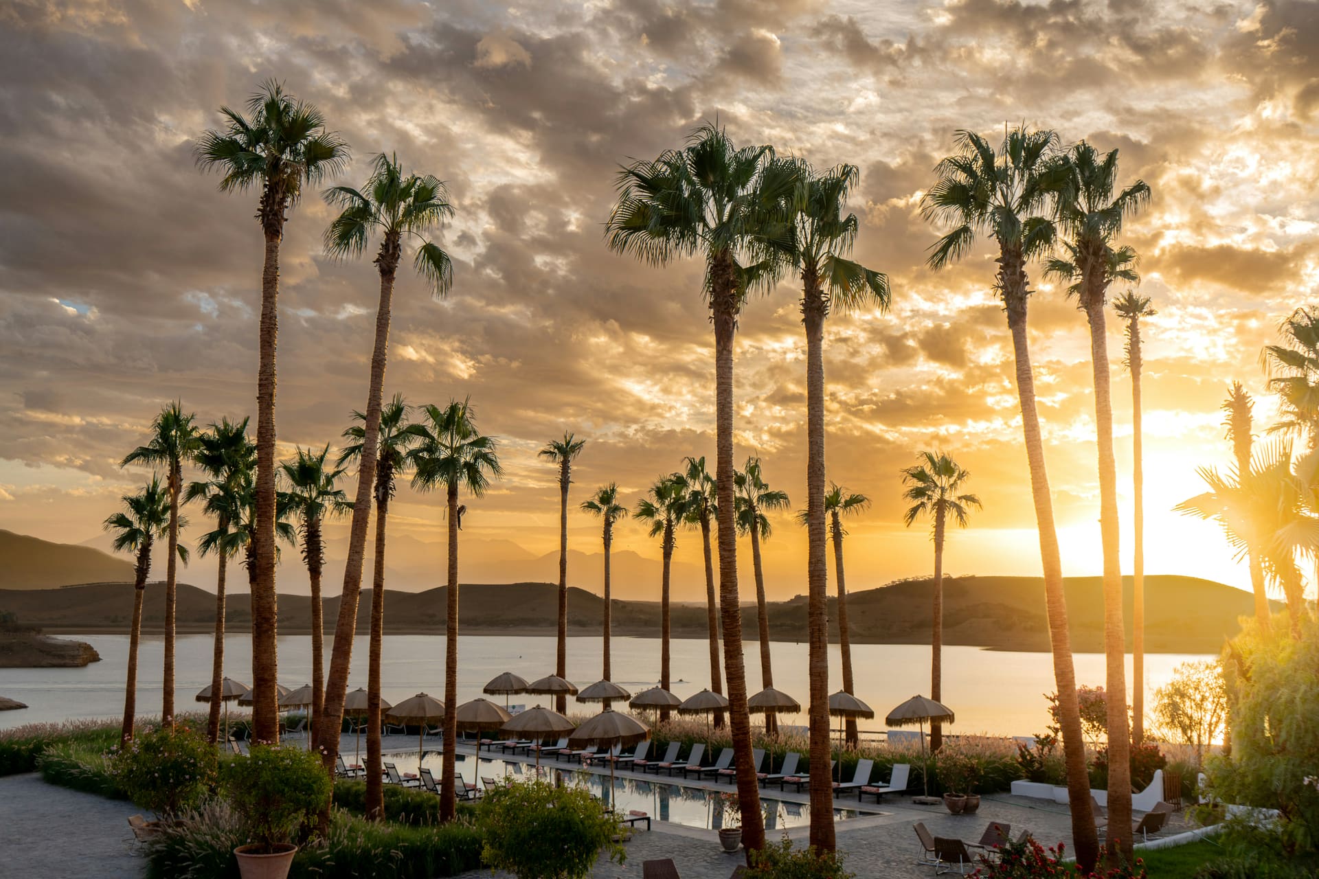 A resort pool at golden hour